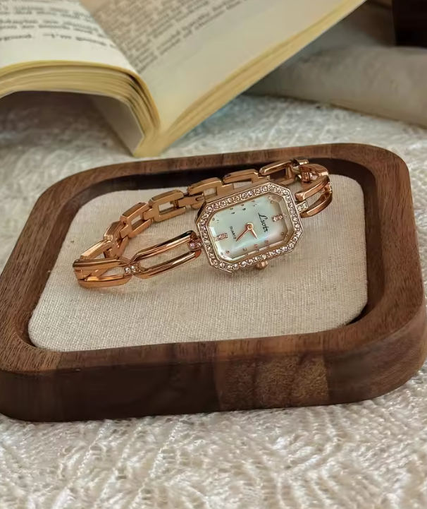 Rose gold rectangular bracelet watch with diamond crystal bezel and open-link chain band for women by Le Belle Heure
