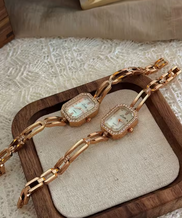 Rose gold rectangular bracelet watch with diamond crystal bezel and open-link chain band for women by Le Belle Heure
