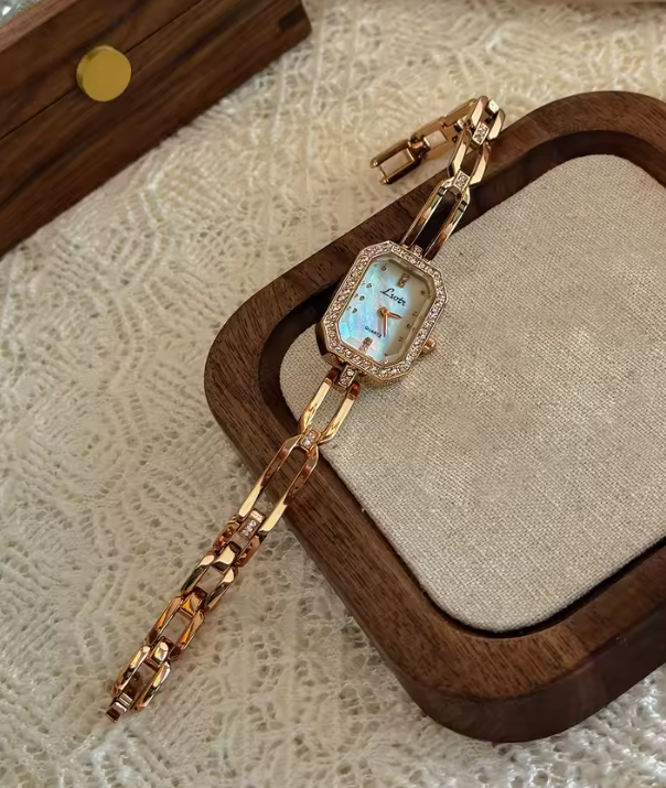 Rose gold rectangular bracelet watch with diamond crystal bezel and open-link chain band for women by Le Belle Heure