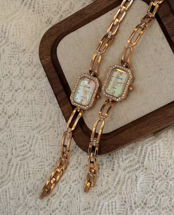 Rose gold rectangular bracelet watch with diamond crystal bezel and open-link chain band for women by Le Belle Heure