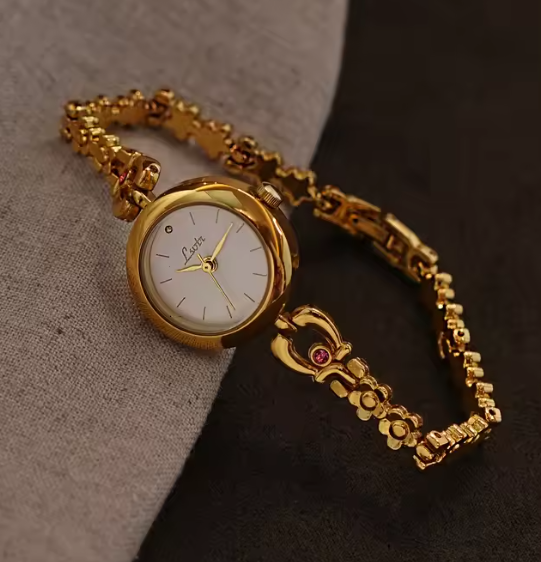 Gold vintage floral rose chain bracelet watch with white round dial and ruby accent for women by Le Belle Heure