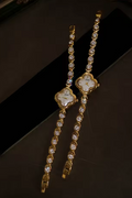 Gold four-leaf clover shaped mother-of-pearl dial quartz watch on a bezel-set round crystal tennis bracelet for women by Le Belle Heure