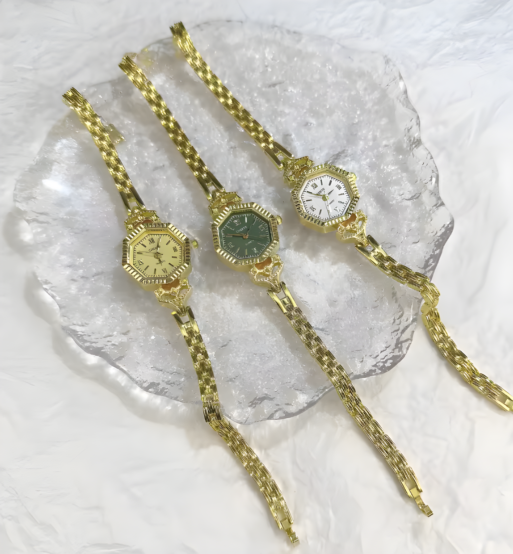 Unique hexagonal (six-sided) cases with a "coin-edge" or fluted bezel that catches the light.