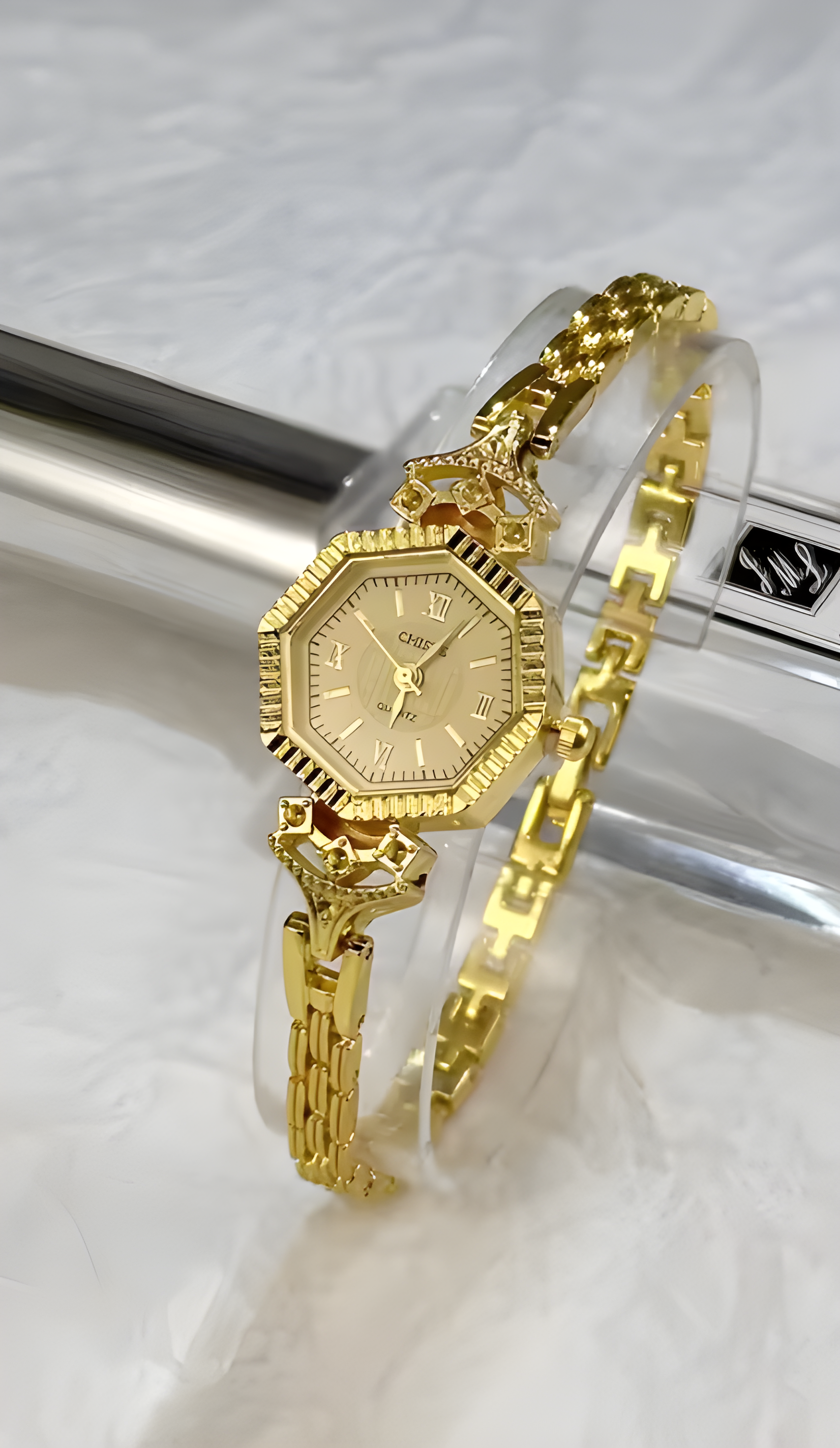 Unique hexagonal (six-sided) cases with a "coin-edge" or fluted bezel that catches the light.