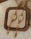 Rose gold rectangular bracelet watch with diamond crystal bezel and open-link chain band for women by Le Belle Heure
