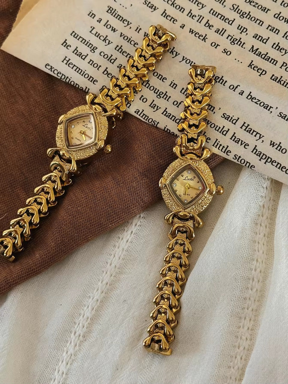 Gold hammered textured cushion square dial ladies bracelet watch
with wheat spine chain and diamond hour markers by Le Belle Heure