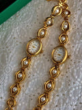 Gold oval bracelet watch with freshwater pearl eye-link chain and
champagne dial with gold hour markers for women by Le Belle Heure