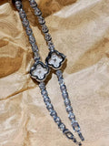 Le Belle Heure women’s silver clover quartz watch with crystal tennis bracelet strap on silk background

silver clover watch, tennis bracelet watch women, elegant ladies quartz watch, crystal jewelry watch, clover bracelet watch gift