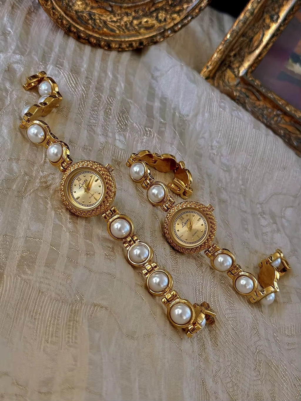 Gold pearl bracelet watch styled on antique gold frame tray – Le Belle Heure women’s watch