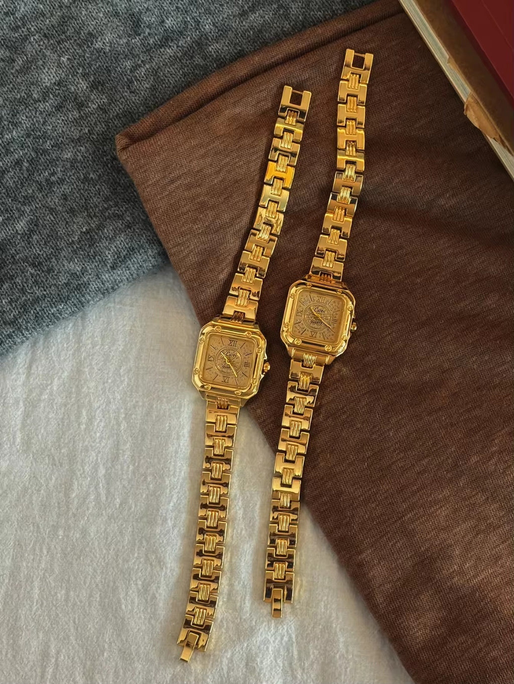 Gold square Roman numeral textured sunburst dial watch with screw
corner accents and wide structured woven link chain bracelet for women by Le Belle Heure