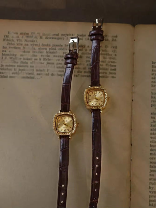 Gold cushion square watch with rope-twist crystal bezel, sunburst
Roman numeral champagne dial and slim dark chocolate crocodile texture leather strap for women by Le Belle Heure