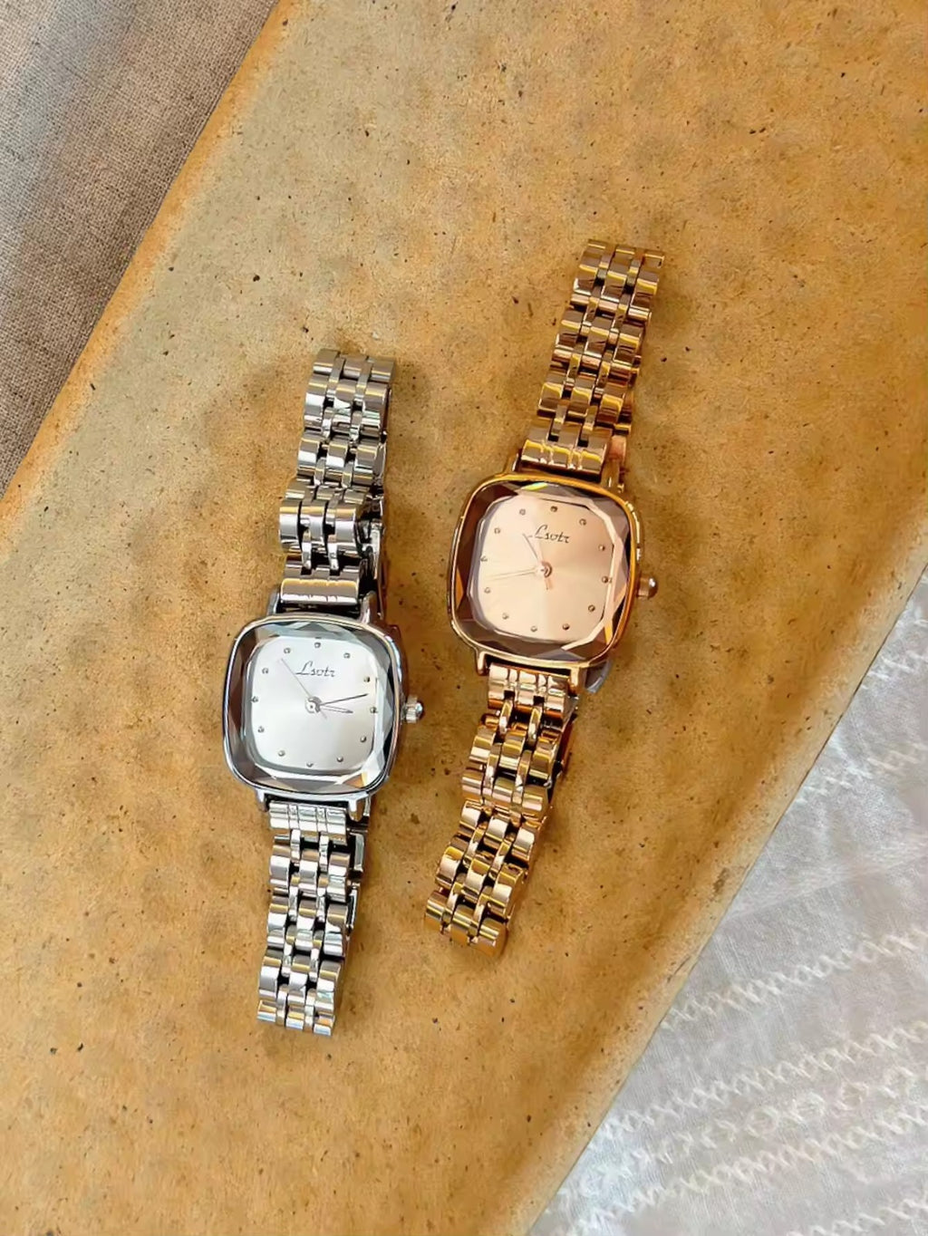 Silver cushion square bevelled case watch with white dot dial and polished five-link president bracelet for women by Le Belle Heure