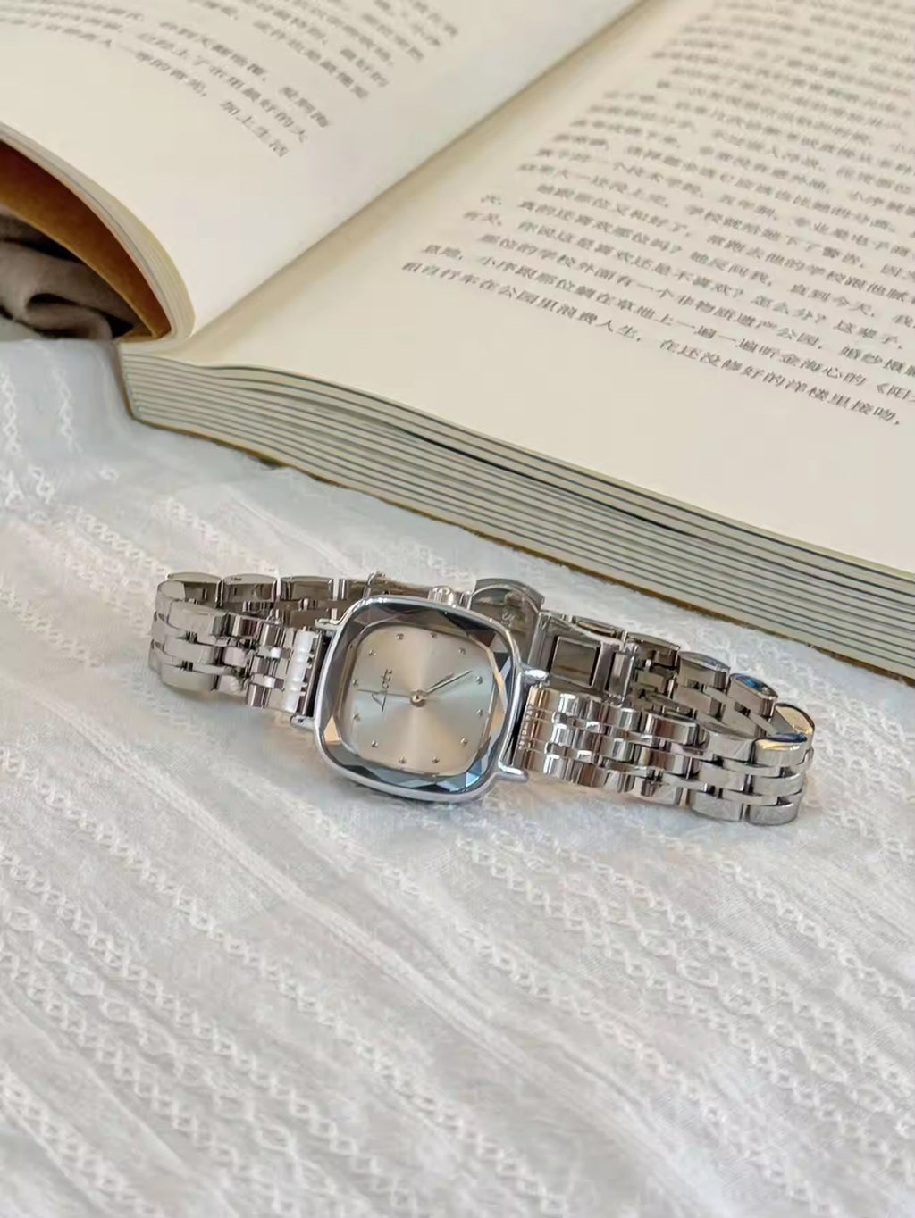 Silver cushion square bevelled case watch with white dot dial and polished five-link president bracelet for women by Le Belle Heure