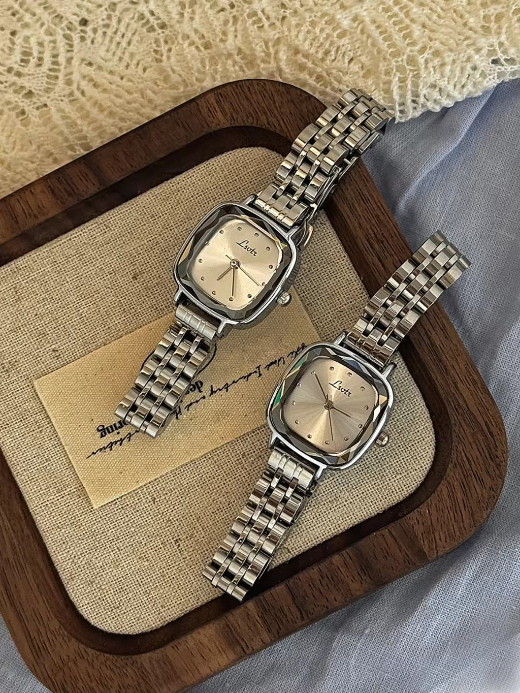 Silver cushion square bevelled case watch with white dot dial and polished five-link president bracelet for women by Le Belle Heure