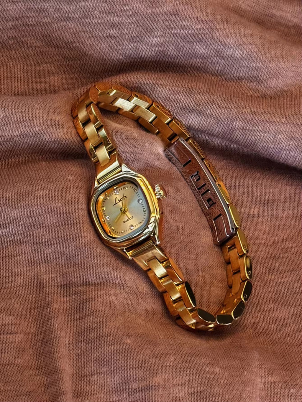 Women’s gold cushion square quartz watch with sunray dial and crystal accents — Le Belle Heure