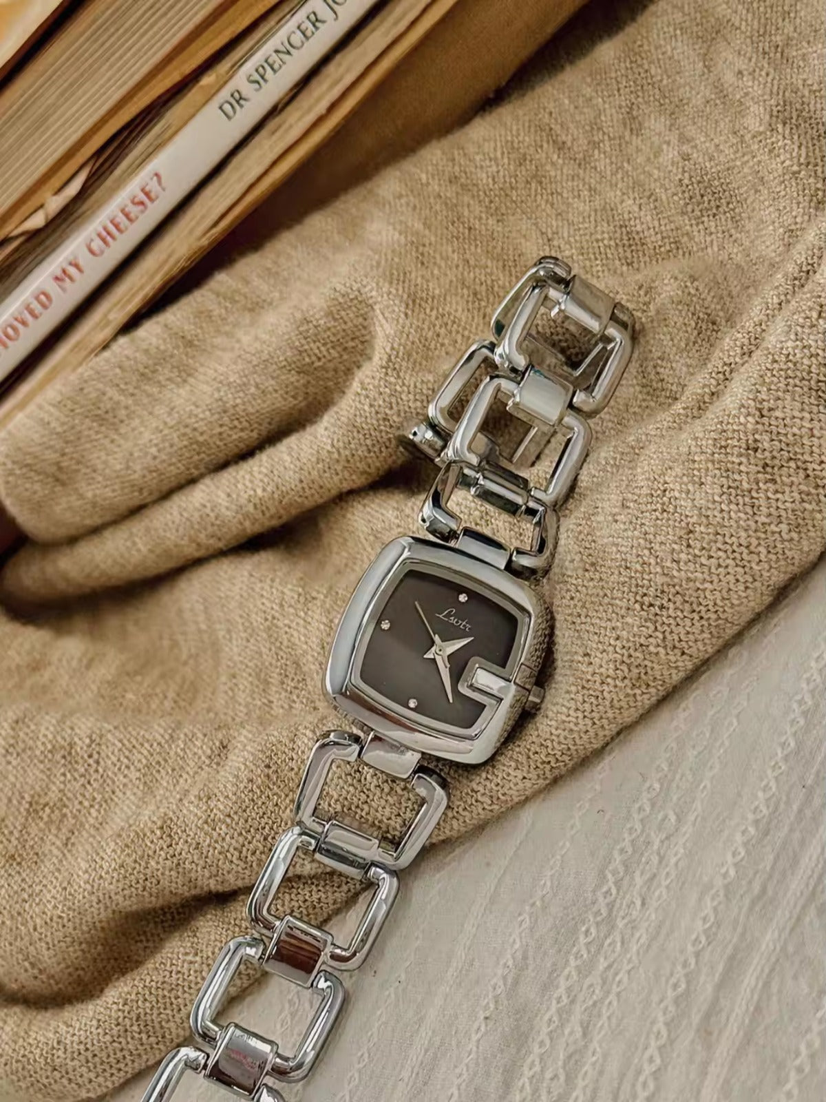 Women’s silver cushion square watch with black mother of pearl dial and open
square-link bracelet — Le Belle Heure